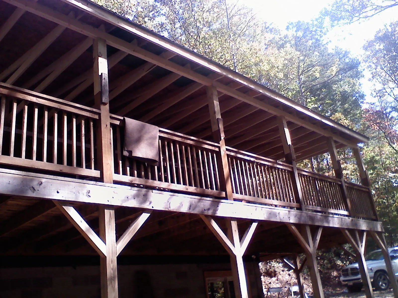 Timber framing under a new elevated porch and deck — Roof Leak Repair in Midlothian by Roofing Brothers